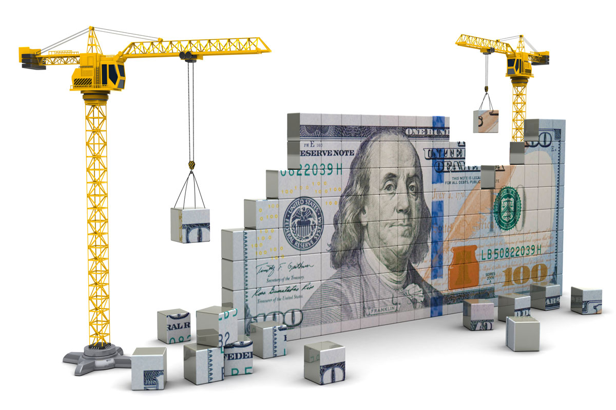 small building cranes assembling little squares with the pattern of the United States dollar bill. In order to create a dollar bill.