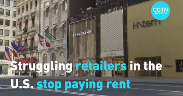 A photo of the exterior of Retail stores in New York with the following text overlaid. Struggling retailers in the U.S. stop paying rent